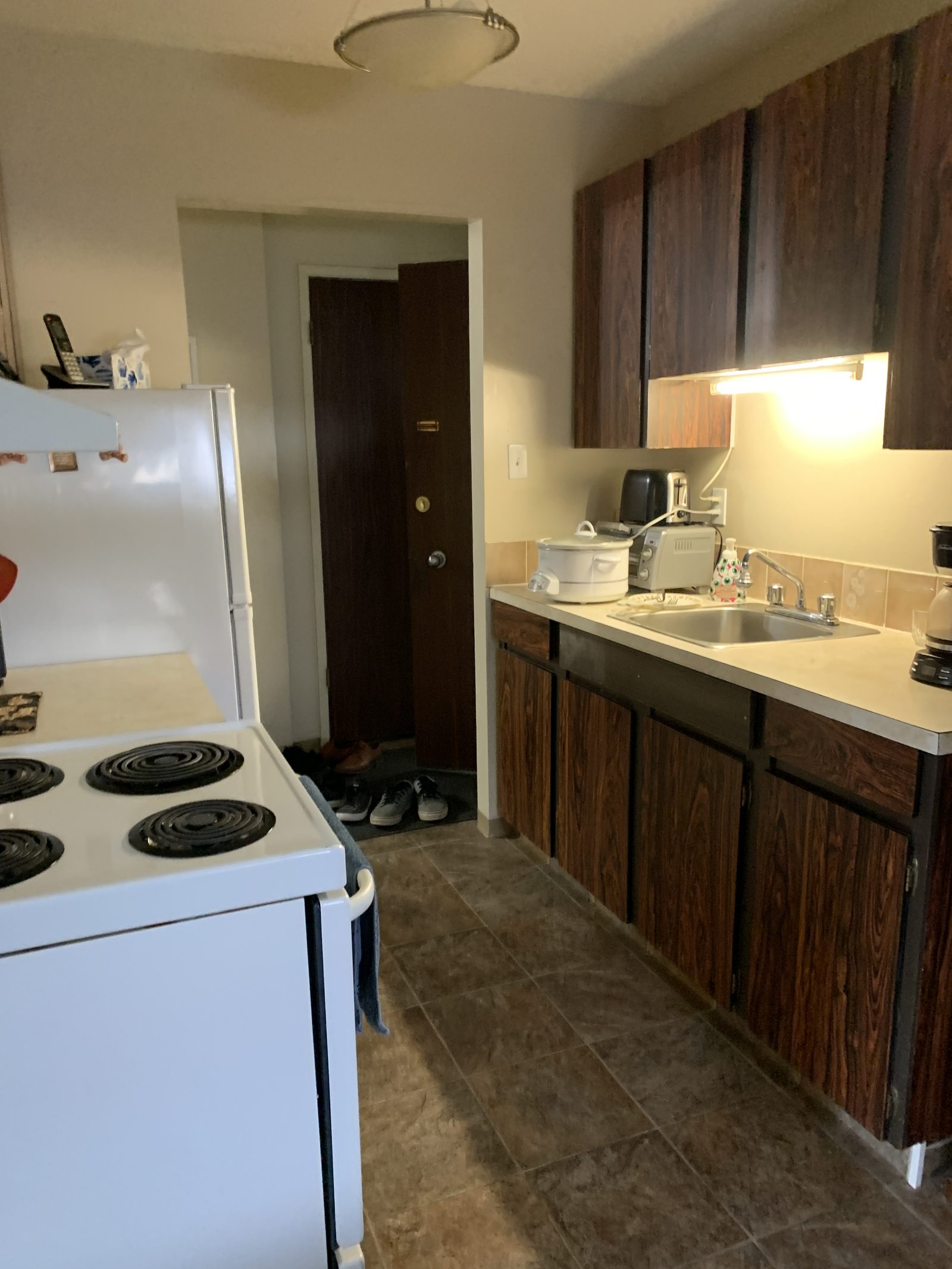 Kitchen before renovation at College Drive