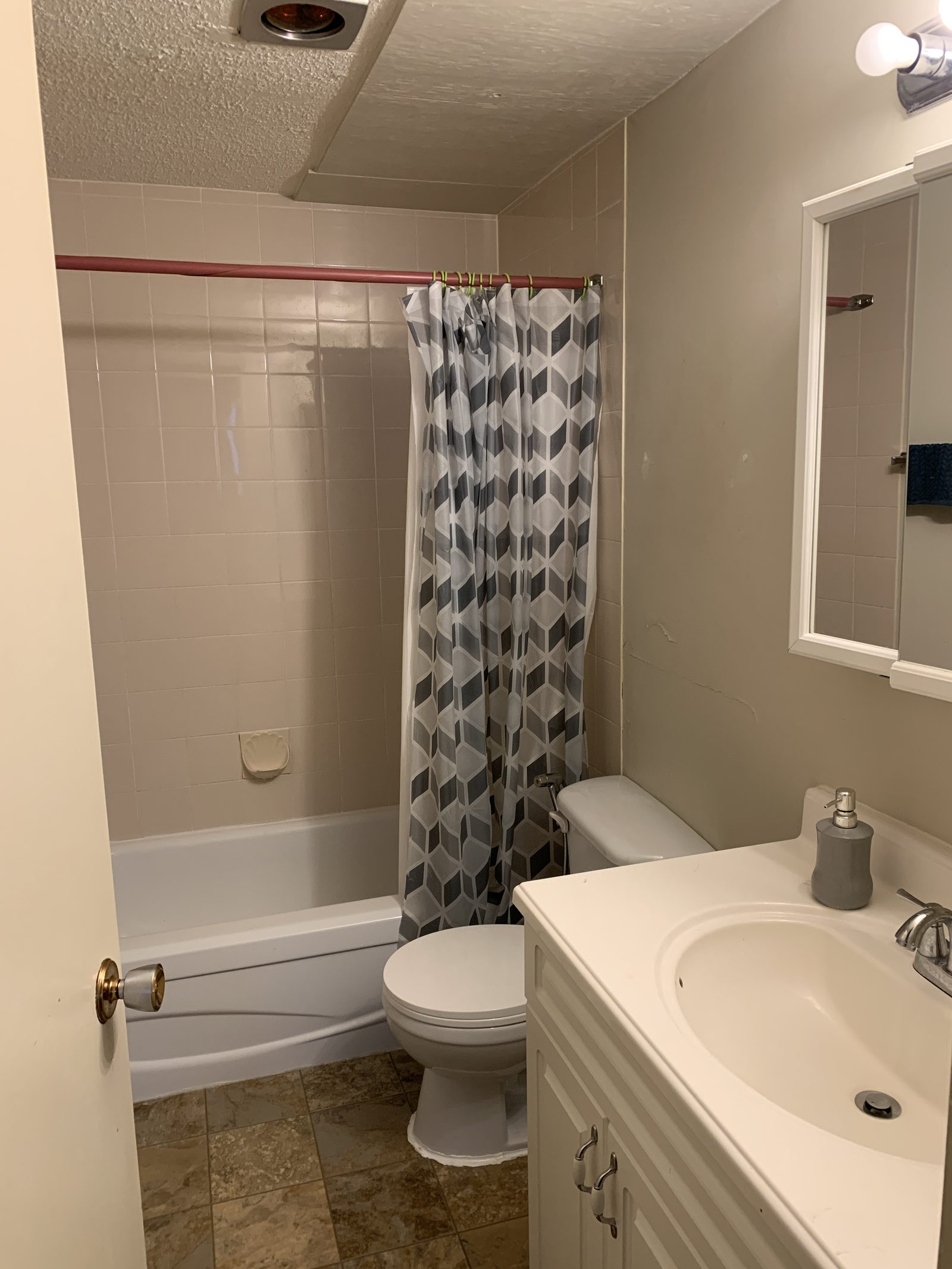 Bathroom before renovation at College Drive
