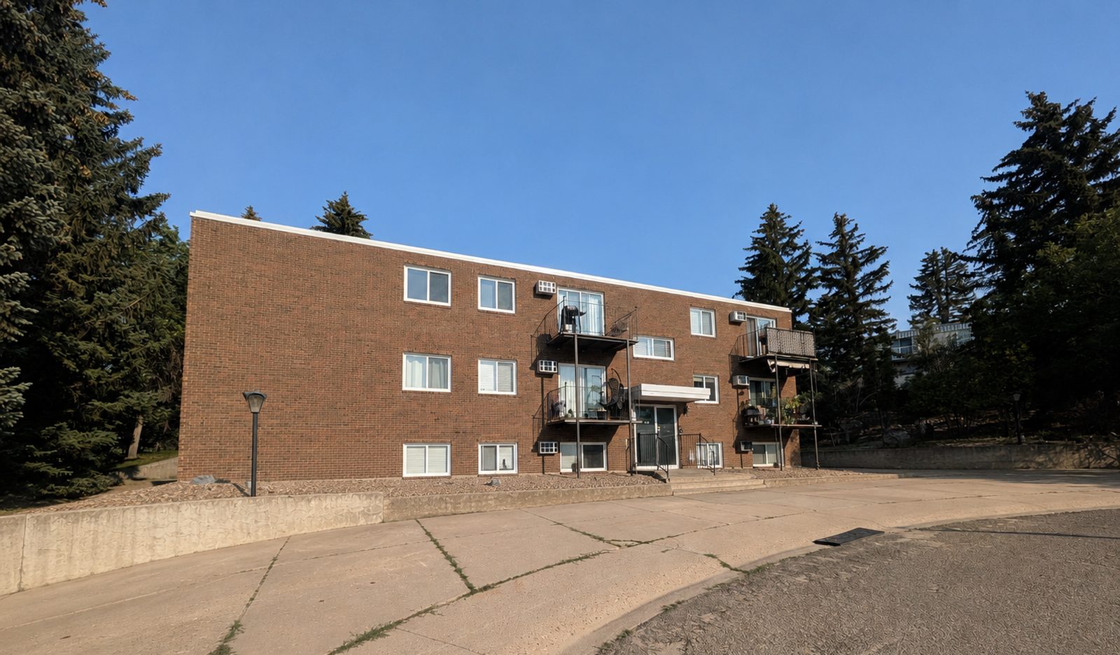 Valleyview Apartments, full south elevation on a clear afternoon